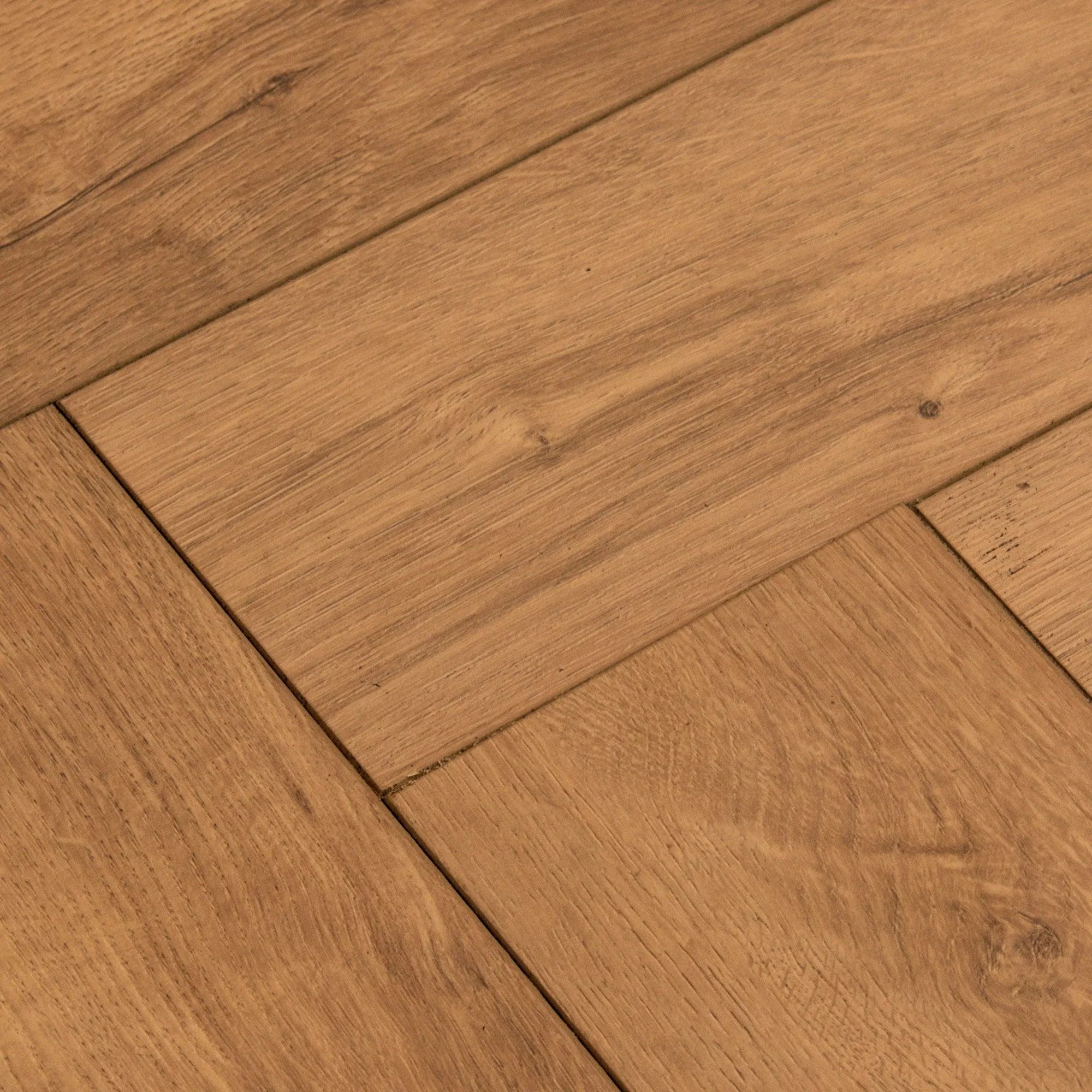 Warm Harvest Oak - Comfort Luxe 12mm Laminate Herringbone Flooring (122147) - Image 4
